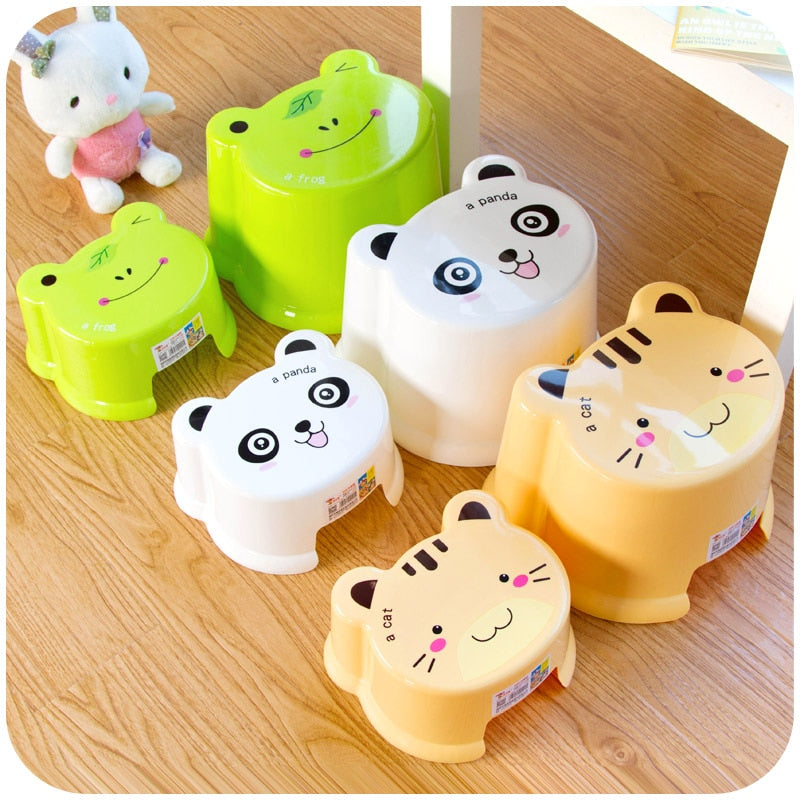 Lovely living room with a small plastic stool thick, non-slip bath bench cartoon child stool changing his shoes stool